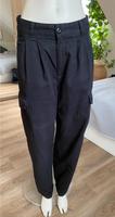 Carhatt Jeans Cargo schwarz Gr.28/ S-M mit Logo-Patch Sachsen - Reinsdorf Vorschau