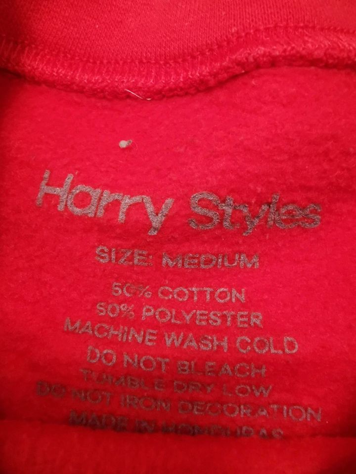 Harry Styles Merch Hoddie Sweatshirt rot mit rosa Schrift Gr.M in Ebermannstadt