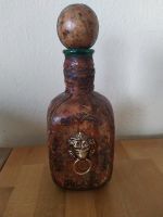 Alte Flasche aus den 60er 70ern mit Leder bezogen und Löwenkopf Nordrhein-Westfalen - Siegen Vorschau