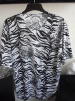 Shirt schwarz/weiß getigert und Tigerköpfe Berlin - Wilmersdorf Vorschau