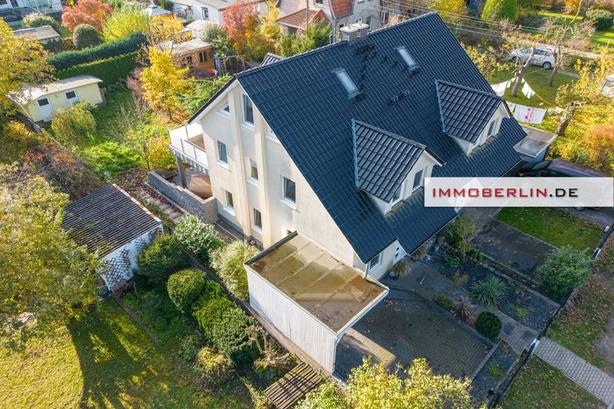 IMMOBERLIN.DE - Exzellentes Haus in KfW-60-Niedrigenergiebauweise mit Südgarten in familiärer Lage in Berlin