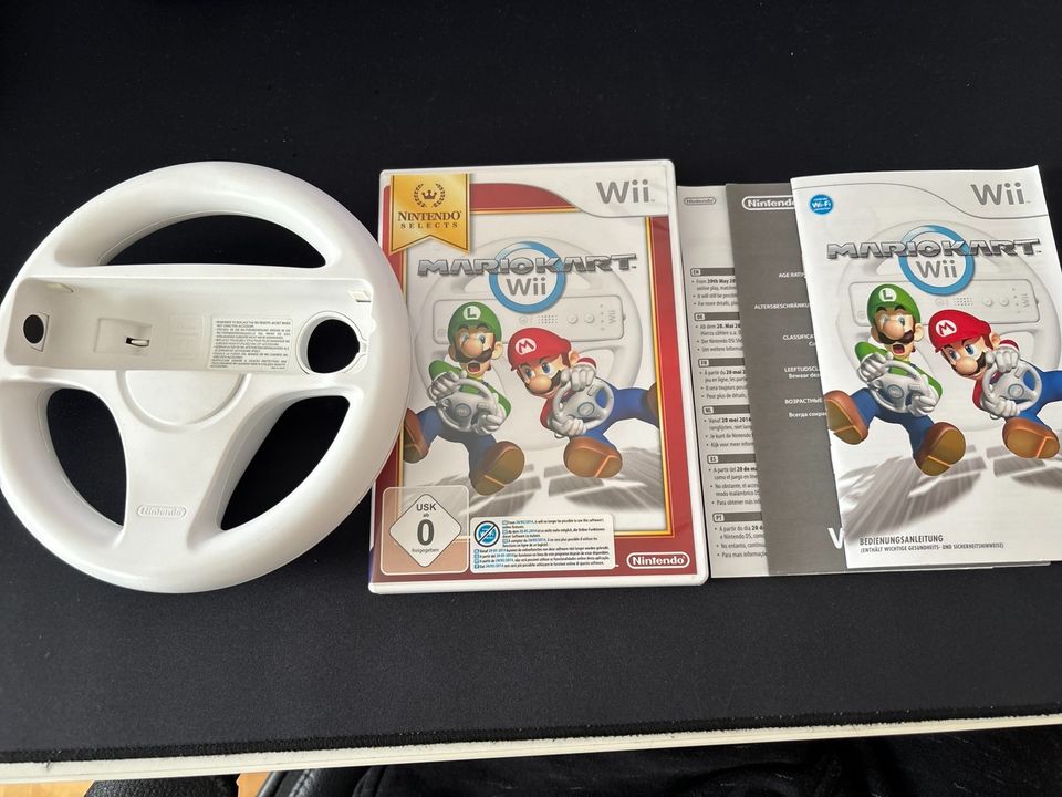 Mario Kart Wii mit einem Lenrad in Stuttgart