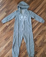 Gr 134 140 Jumpsuit Onesie Einteiler kuschelig grau Kapuze Hessen - Wöllstadt Vorschau