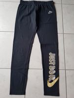 Nike Mädchen Leggings schwarz gold silber Größe L (146 - 156) Niedersachsen - Wallenhorst Vorschau