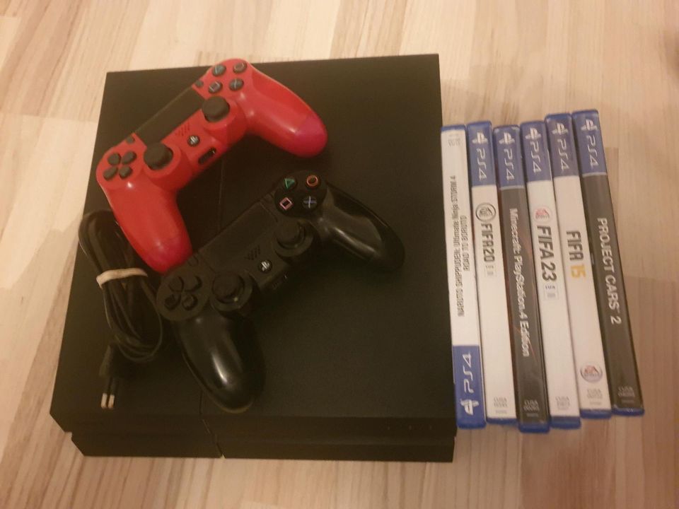 Playstation 4 mit 2 Controller und 6 Spiele in Neuenrade