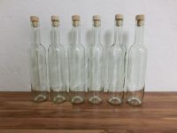 Sehr viele Schnapsflaschen 0,5 L mit Kork-Holz Stöpsel Hessen - Florstadt Vorschau