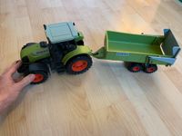 Spielzeug-Traktor Claas mit Anhänger Bayern - Würzburg Vorschau