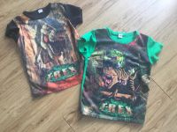 2 Dino T-Shirts Gr. 128 Sachsen-Anhalt - Dessau-Roßlau Vorschau