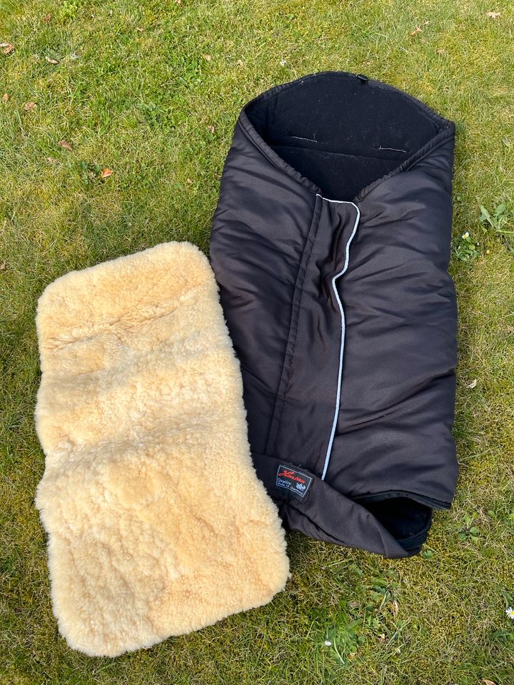 Winter Fußsack und Fell zum Drunterlegen in Satrup