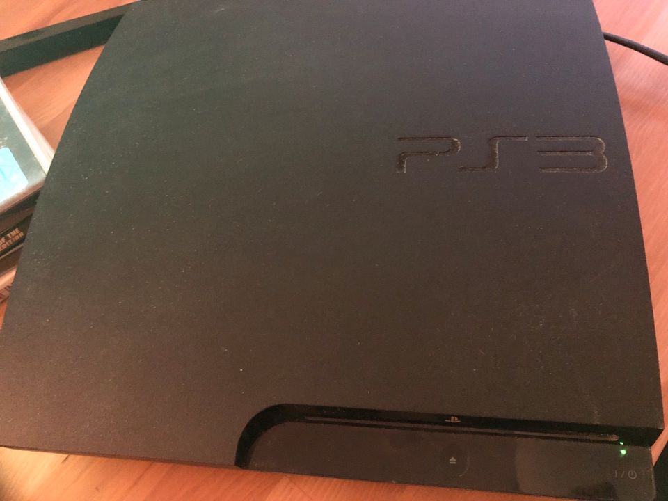 PS3 Playstation 3 Slim Konsole mit 3 Controller und 4 Spiele in München