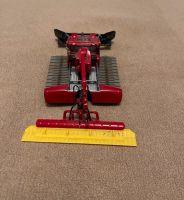 SIKU 4911 Pisten Bully mit Kran rot 1:50 Schleswig-Holstein - Tangstedt  Vorschau