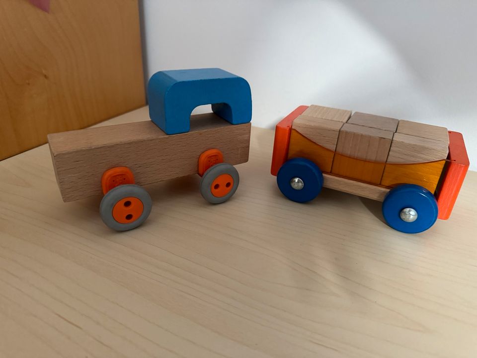 Haba Holzspielzeug Traktor Hänger Steine Räder auseinander machen in Gierstädt