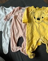 3 baby Bodys 62/68 weiss/rosa/gelb winnie pooh Bayern - Schwabach Vorschau