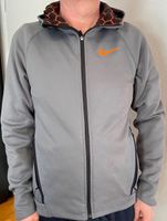 Nike Dry Fit Sportjacke,hellgrau, mit Kapuze,Gr. M, guter Zustand Baden-Württemberg - Moos Vorschau