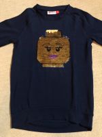 Lego Wear Langarmshirt Gr. 116 Kopf Wendepailletten Niedersachsen - Amelinghausen Vorschau