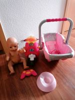 Baby Born Paket mit Zugabe (Roller, Maxi Cosi, Töpfchen, Puppe) Baden-Württemberg - Pfullingen Vorschau