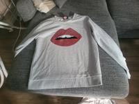 neuwertiger Baumwollpullover mit Glitzermund Gr L grau Frankfurt am Main - Sachsenhausen Vorschau