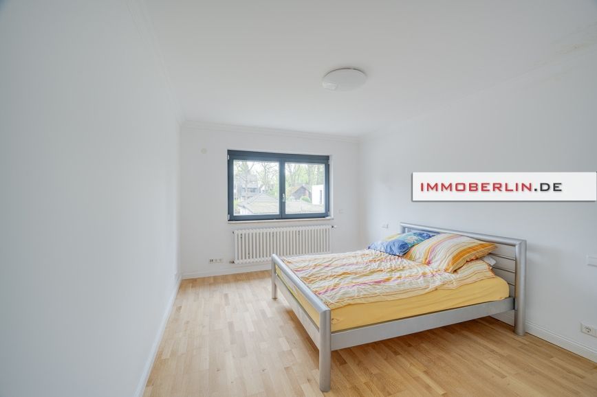 IMMOBERLIN.DE - Komfortable Wohnung mit großen Terrassen, Garage + Carport in idyllischer Lage in Berlin