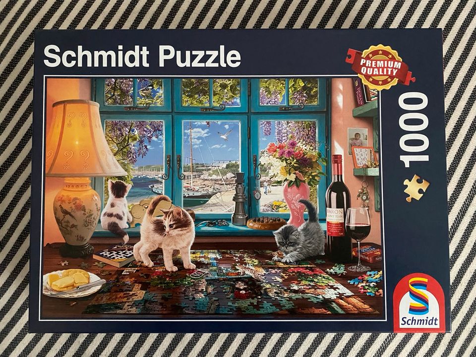 Schmidt Puzzle „Am Puzzle-Tisch“ Katzen in Berlin