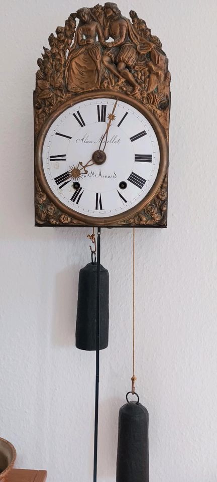 alte Uhr mit Pendel in Sonthofen
