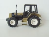 Siku Farmer - Renault 145-14 TX, gold 1:32 Köln - Mülheim Vorschau