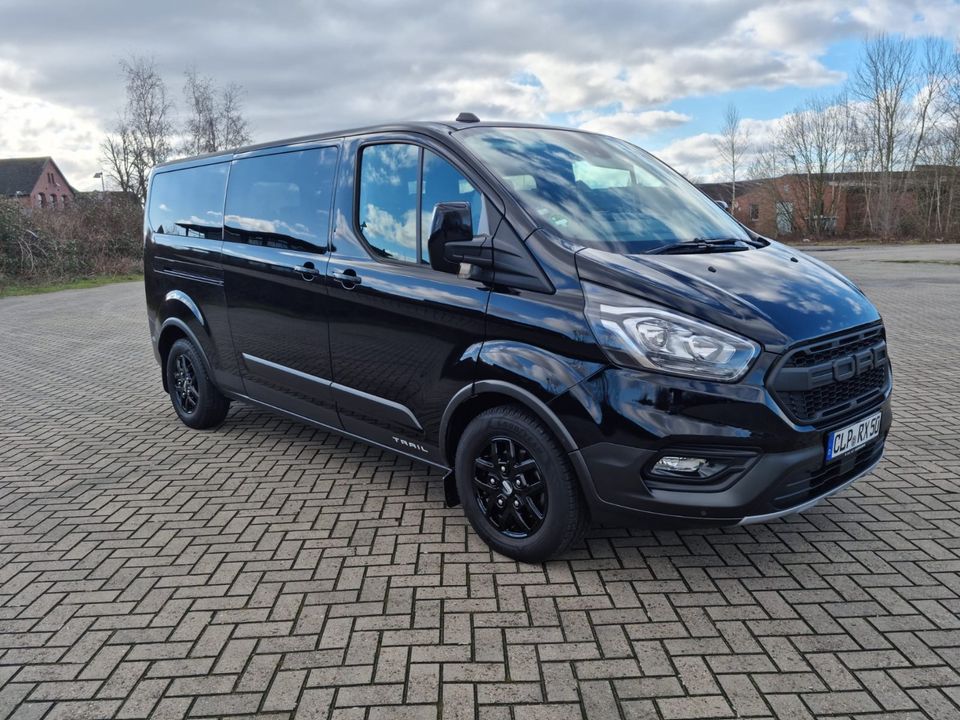 Ford Transit Custom Trail L2 Navi 9 Sitze Cam AHK LED in Molbergen