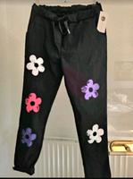 NEU Joggpant Italy Mode schwarz mit Blumen Nordrhein-Westfalen - Bergkamen Vorschau