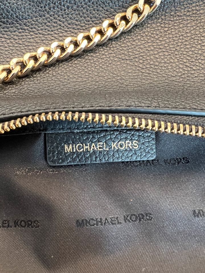 Michael Kors Tasche Pochette schwarz gold Leder in Köln