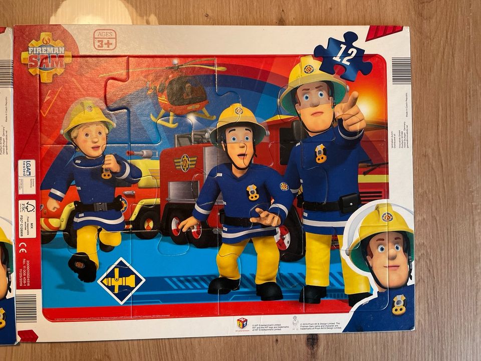 Zwei Kleinkinder-Puzzle Feuerwehrmann Sam in Ringe