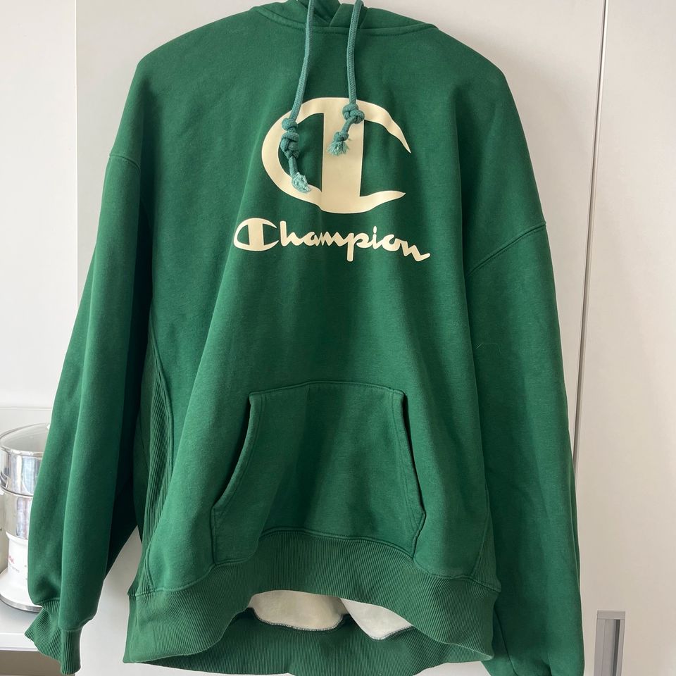 Champion Pullover Hoodie mit Logo-Schriftzug in Heidelberg