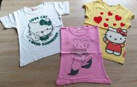 2 süße T-Shirts mit niedlichen Hello Kitty Motiven Gr. 122/128 Niedersachsen - Alfeld (Leine) Vorschau