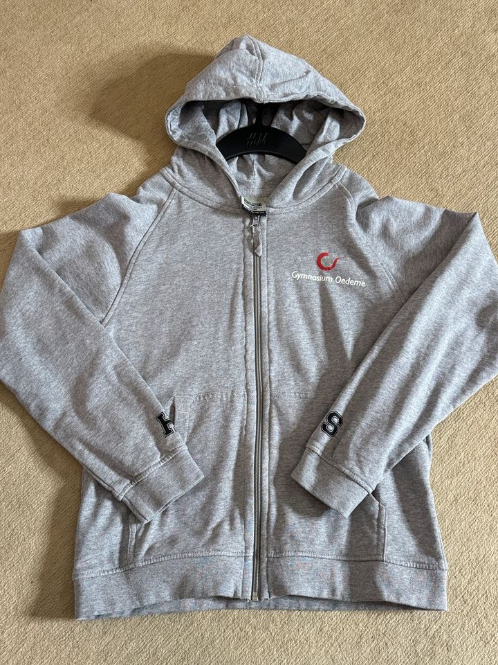 Kapuzen Sweatjacke Gymnasium Oedeme Gr. 146/152 NEU in Amelinghausen