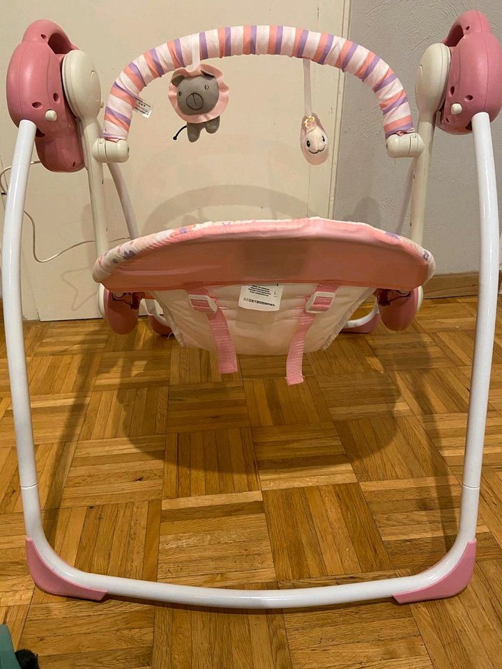Baby Schaukel von TRUESPEED elektronisch betrieben in rosa in Rees
