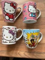 Verschiedene Hello Kitty und Asterix Tasse/n München - Moosach Vorschau