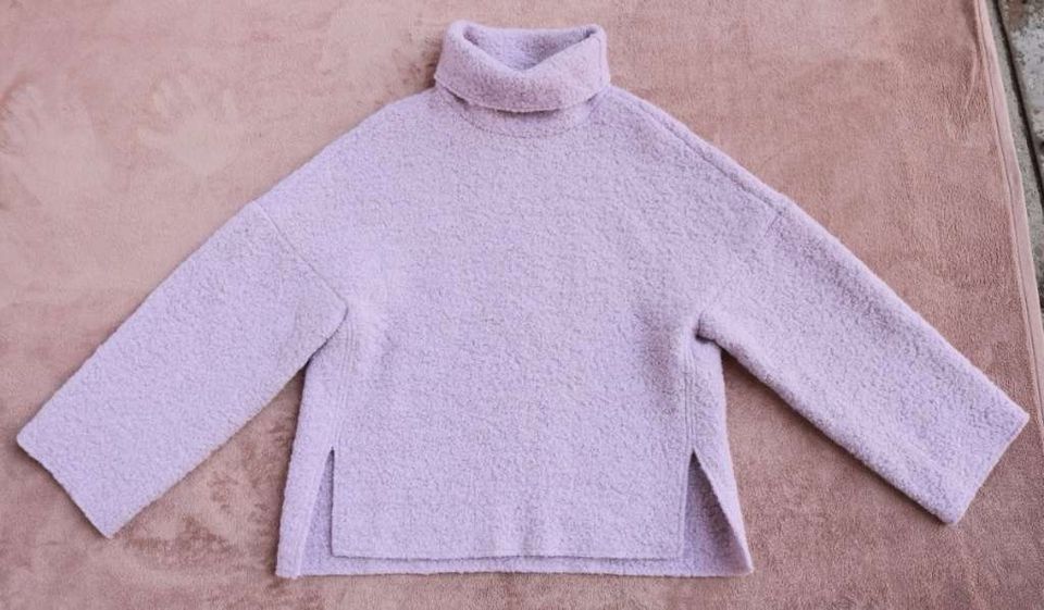 Gauchere Pullover aus Bouclé aus Wolle in München