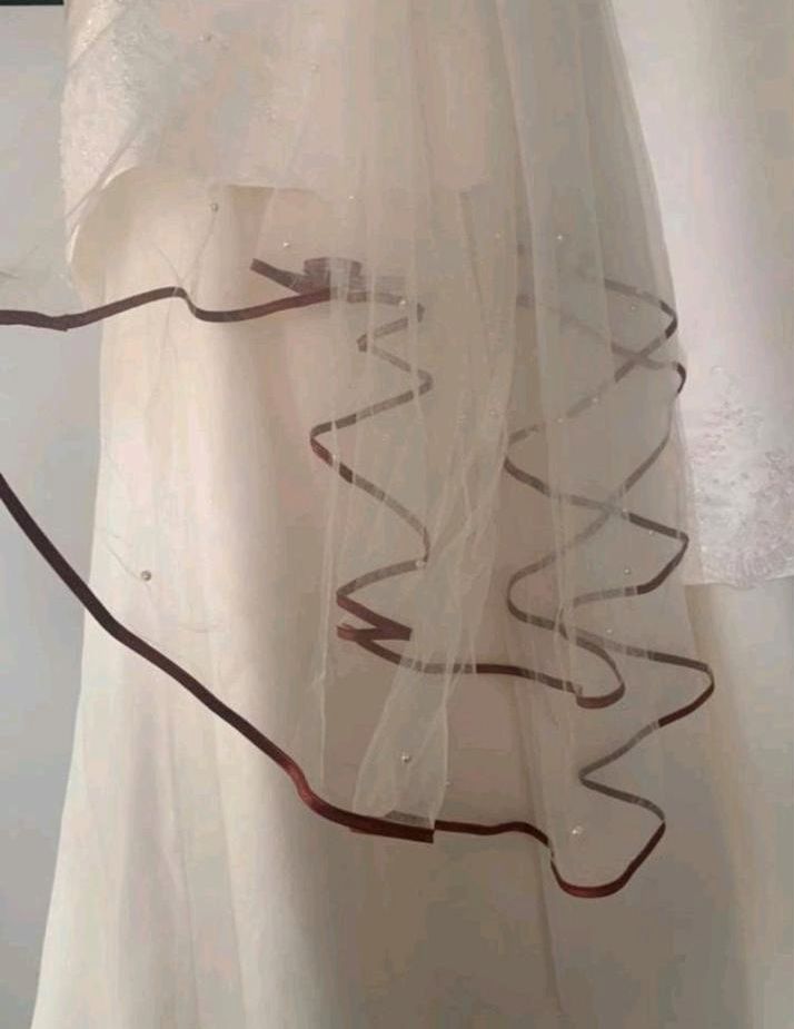 Hochzeitskleid in Quellendorf