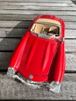 Burago 1:18 Mercedes 300 SL Roadster 1957, rot Hessen - Friedrichsdorf Vorschau