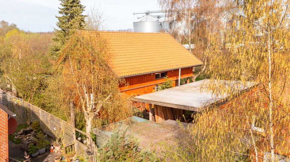 Wohnanlage mit 4 Einheiten - drei vermietete Reihenhäuser und ein freistehendes Holzhaus in Lensahn in Lensahn