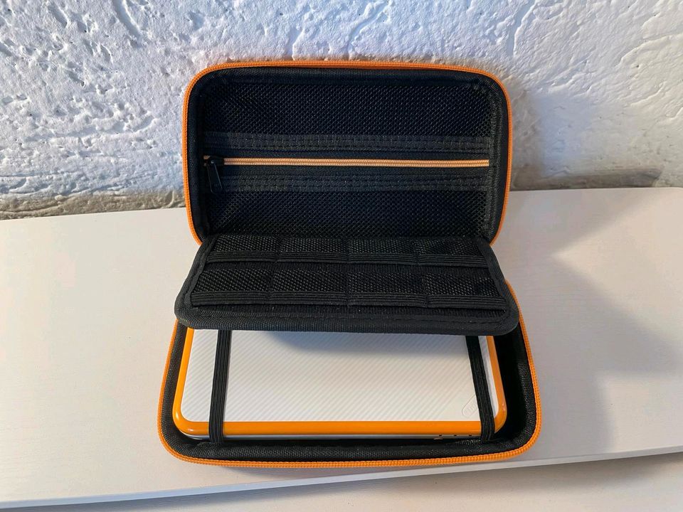 New Nintendo 2DSXL, weiß-orange, neuwertig in Sauerlach