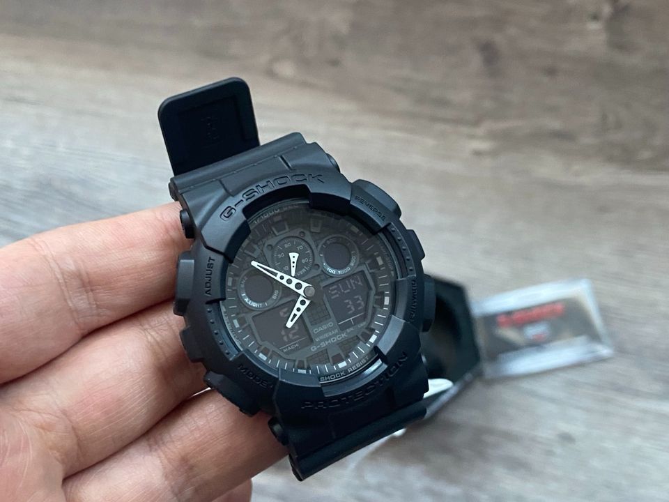 Casio G-Shock Uhr Armbanduhr 200m GA-100 schwarz Neu mit Box in Rheda-Wiedenbrück