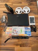 Verkaufe meine Wii + Balance Board+ 3 Controller+ 2 Lenkräder Hessen - Flörsheim am Main Vorschau