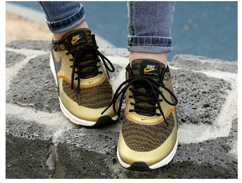 Black & gold air max thea trainers hotsell