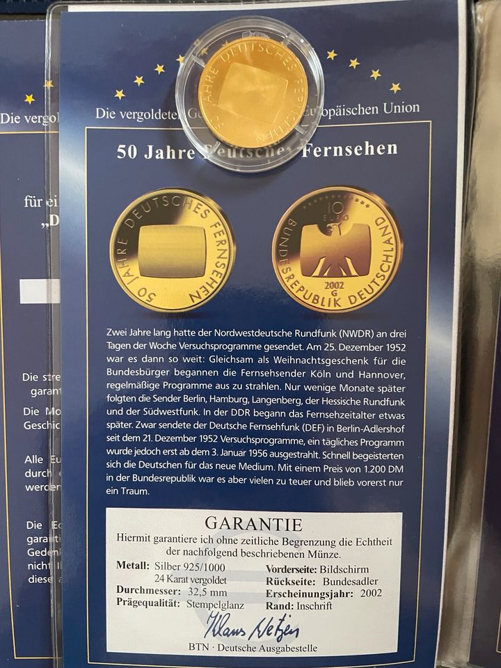 12 vergoldete Gedenkmünzen der Europäischen Union in München