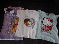 3 T-Shirts Gr. 122/ 128 Hello Kitty,  Pferde, Hannah Montana Bochum - Bochum-Wattenscheid Vorschau