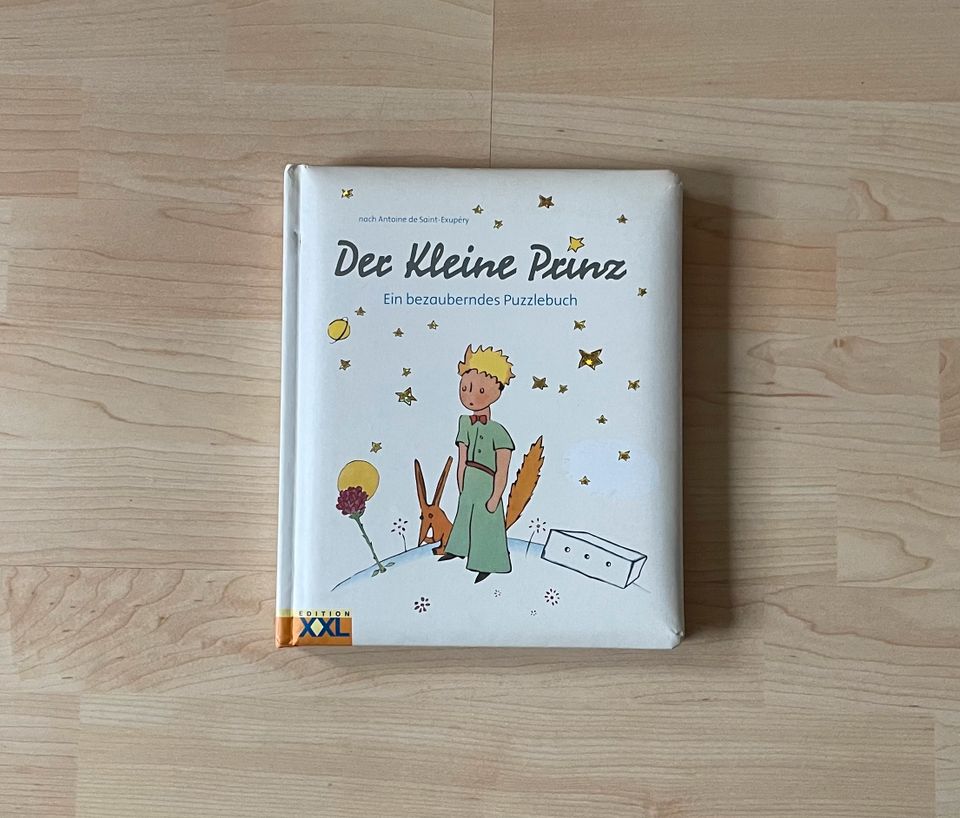 Buch / Puzzlebuch "Der kleine Prinz" von Antoine de Saint-Exupéry in Köln