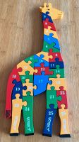 Ein Puzzle mit Zahlen und Buchstaben ab 3 Jahren aus Holz Giraffe Hessen - Neuberg Vorschau