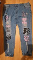  lässige Jeans in Gr. 5 XL - Graffiti-Print, zerrissen, leicht Dresden - Cotta Vorschau