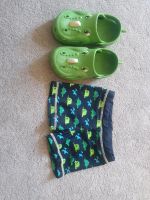 Badehose 98/104 mit Badeschuhe Gr. 27 Dinosaurier Sachsen-Anhalt - Magdeburg Vorschau