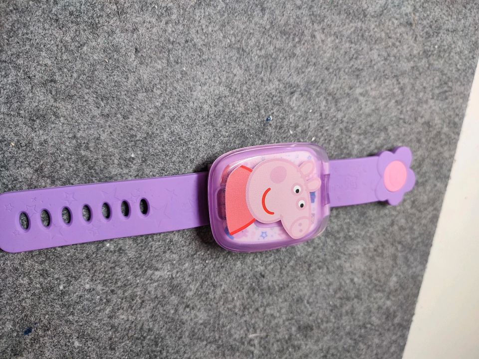 VTech Peppa Wutz Lernuhr, Spielzeug in Leverkusen