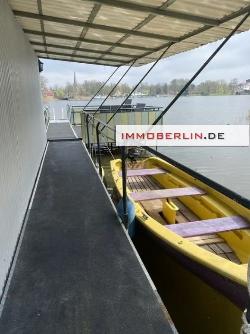 IMMOBERLIN.DE - Zauberhafte Aussichten! Massives Haus + Bootshaus mit 2 Booten auf Wassergrundstück in Groß Köris